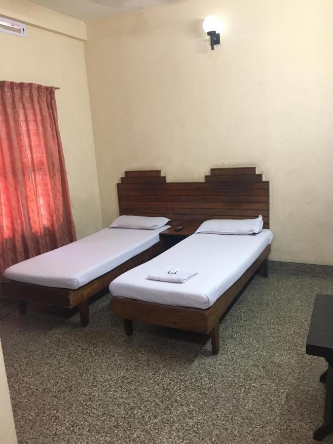 Nellimoottil Guest House Коттаям Номер фото